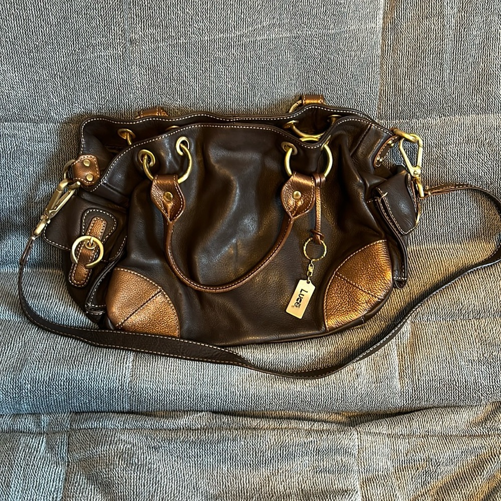 Beautiful brown leather very good condition Luce handbag. Soft leather